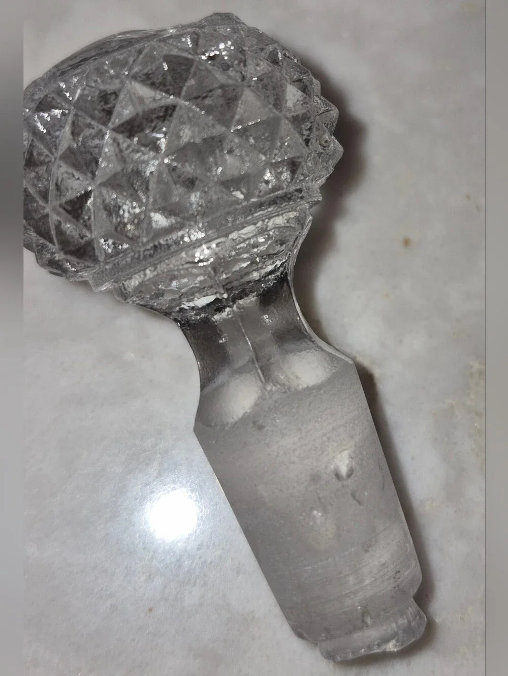 3 Vintage or Antique cut-glass cruets with matching stoppers and handles